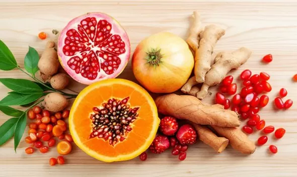 A colorful assortment of fruits and vegetables displayed on a wooden table, emphasizing natural health and beauty.